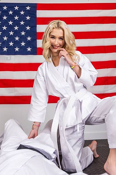 Patriotic blonde Emma Rosie practices karate and anal sex with her trainer Image #6